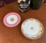 Pair of Pink and White Ceramic Plates