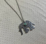 Silver Necklace With Elephant Pendant and Turquoise Stone Accent