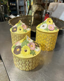 Trio of Yellow Ceramic Woven Style Jars With Floral Accents