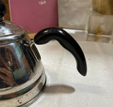 Small Silver Tea Kettle With Black Handles