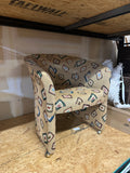Pair of Fun Design Covered Tan Chairs on Wheels- Missing 1 Wheel