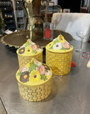 Trio of Yellow Ceramic Woven Style Jars With Floral Accents