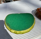 Pair of Ceramic Green and Brown Catchalls With Eagle Accents