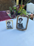 Pair of Gold Frames With Matching Photos