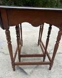 Pair of Wooden Carved Nesting Game Tables With Flip-Up Sides
