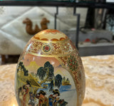 Small Asian Ceramic Detailed Decorative Egg With Gold Accents
