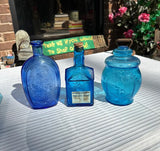 Trio of Blue Glass Jars and Bottles