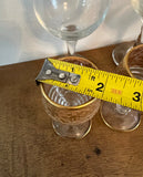 Collection of Glasses With Brass Details