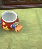 Pair of Red Ceramic Asian Catchalls With Wooden Handles
