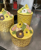 Trio of Yellow Ceramic Woven Style Jars With Floral Accents