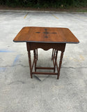 Pair of Wooden Carved Nesting Game Tables With Flip-Up Sides