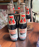 Set of Vintage Coca Cola Bottles and Holder With University of Alabama Accents