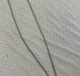 Silver Necklace With Elephant Pendant and Turquoise Stone Accent