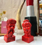 Pair of Red Asian Busts