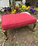 Red Covered Ottoman With Gold Legs