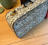 Animal Print Suitcase With Gold Accents