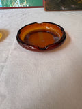 Pair of Round Amber Colored Glass Ashtrays
