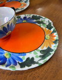 Pair of Orange and Blue Ceramic Plates and Teacups