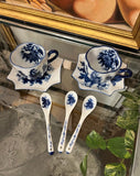 Collection of Blue and White Floral Teacups, Saucers, and Spoons- Set of 7