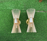 Pair of Gold Metal Small Tubed Starburst Style Wall Sconces