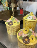Trio of Yellow Ceramic Woven Style Jars With Floral Accents