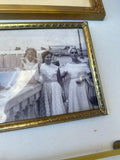 Pair of Vintage Family Prints in Gold Frames