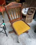 Antique Bankers Chair With Nail Head Trim and Wheels