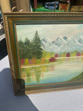 Gold and Green Framed Riverside Painting With Colorful Foliage and Mountains