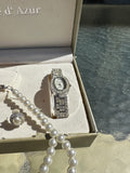 Cote D Azue Collection of Pearl Necklace, Earrings, and Watch