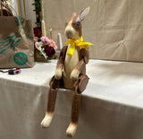 Wooden Painted Rabbit Shelf Decor With Yellow Ribbon