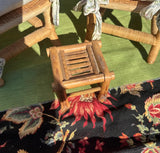 Pair of Miniature Wicker Chairs With Floral Cushions and Matching Ottoman