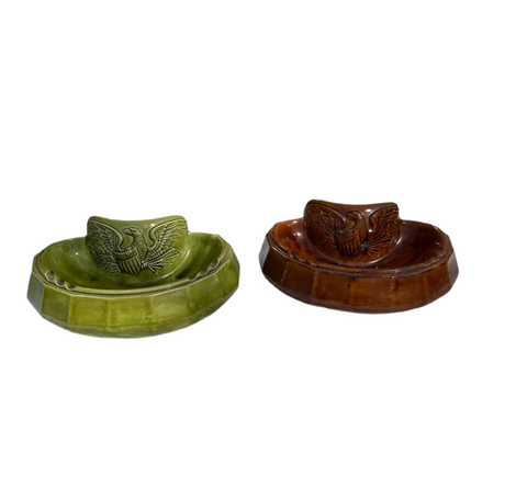 Pair of Ceramic Green and Brown Catchalls With Eagle Accents