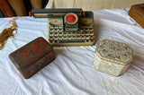 Collection of Metal Boxes and Typewriter