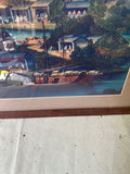 Framed Colorful Painting of a Village by the Water