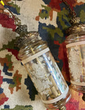 Pair of Glass Pendant Lights With Floral and Brass Accents