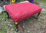 Red Covered Ottoman With Gold Legs