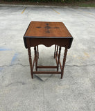 Pair of Wooden Carved Nesting Game Tables With Flip-Up Sides