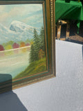 Gold and Green Framed Riverside Painting With Colorful Foliage and Mountains