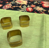 Collection of Square Brass Napkin Rings- Set of 7