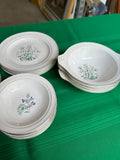 Collection of Small Plates and Bowls With Different Flower Designs