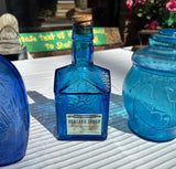 Trio of Blue Glass Jars and Bottles