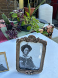 Pair of Gold Frames With Matching Photos