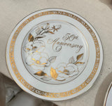 Pair of 50th Anniversary Ceramic Decorative Plates With Gold Accents