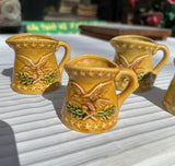 Collection of Yellow Ceramic Measuring Cups With Eagle Accents- Set of 6