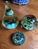 Trio of Green and Blue Glass Paperweights