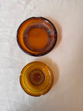 Pair of Round Amber Colored Glass Ashtrays