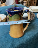 Vintage Hand Made Yellow Pottery Pitcher With Blue and Green Accents