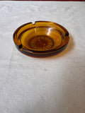 Pair of Round Amber Colored Glass Ashtrays
