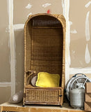 Tall Wicker Porter Chair With Compartment