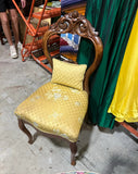 Mid Century Modern Wooden Carved Chair With Yellow Cushions and Attached Pillow
